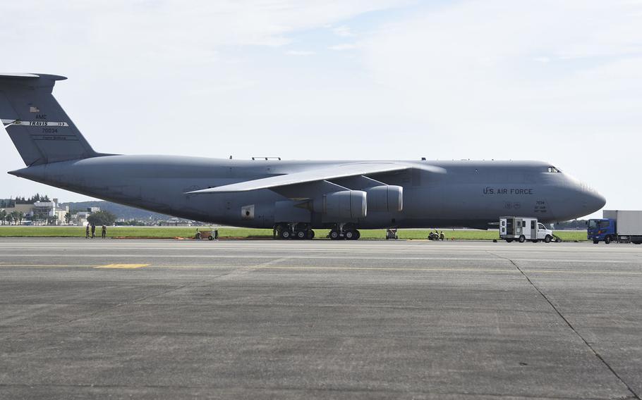 A C-5M Super Galaxy parks on the flight line at Yokota Air Base, Japan, Sept. 13, 2021.