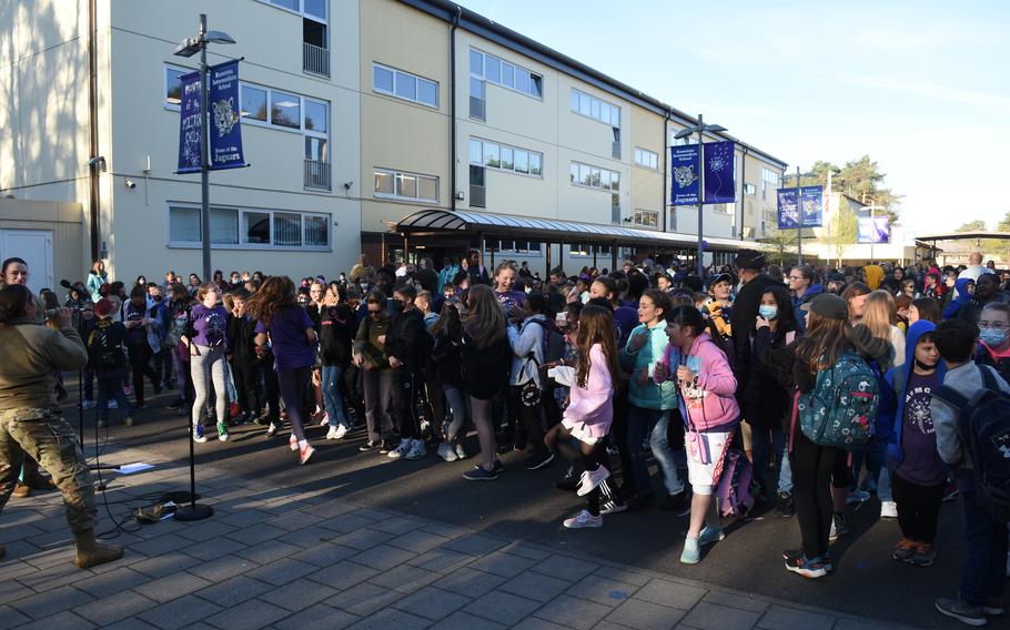 Students at Ramstein Intermediate School in Germany dance in the school courtyard while the U.S. Air Forces in Europe rock band plays on April 19, 2022. The festivities were part of the school’s celebration for Month of the Military Child.
