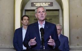 House Speaker Kevin McCarthy of Calif., speaks during a news conference after President Joe Biden and McCarthy reached an "agreement in principle" to resolve the looming debt crisis on Saturday, May 27, 2023, on Capitol Hill in Washington. Rep. Patrick McHenry, R-N.C., a key Republican in the debt limit negotiations and chairman of the House Financial Services Committee, back right, and Rep. Garret Graves, R-La., McCarthy's top mediator in the debt limit talks, left, look on. 