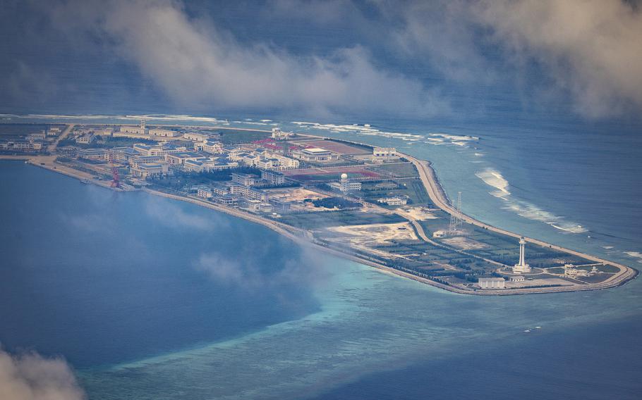 Buildings and structures are seen on the artificial island built by China in Subi Reef on Oct. 25, 2022, in Spratly Islands, South China Sea. China has progressively asserted its claim of ownership over disputed islands in the South China Sea by artificially increasing the size of islands, creating new islands and building ports, military outposts and airstrips.