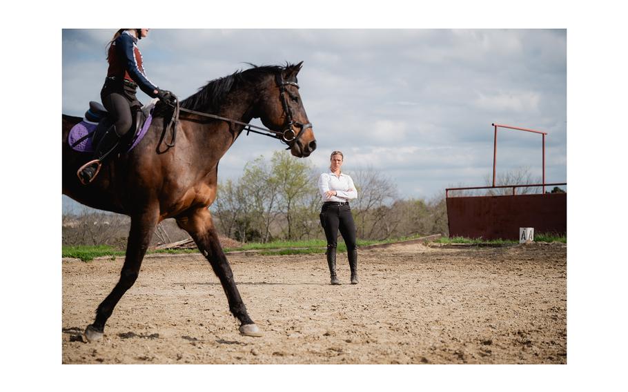 Ellen Doughty watches a student during a private lesson at Rockwall Hills Equestrian Center in Rockwall, Texas.