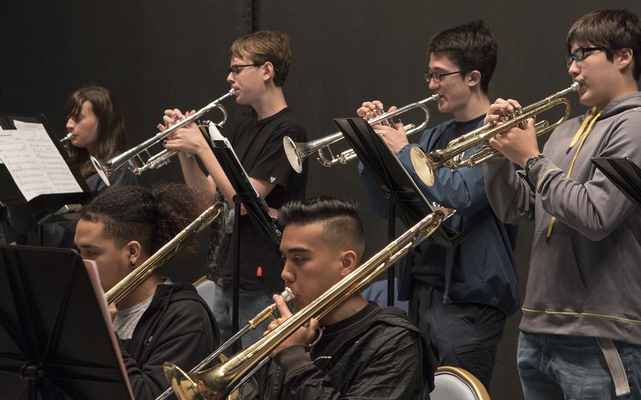 The horn section delivers its part of  "So What," by Miles Davis, at the Taiyo Community Center on Yokota Air Base, Japan, on Nov. 16, 2022.