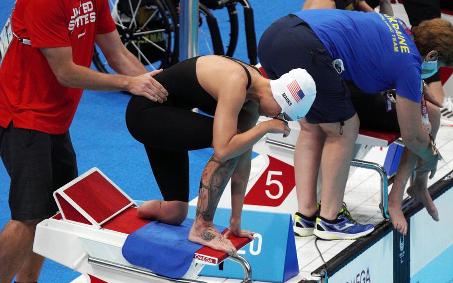 
Army Sgt. 1st Class Elizabeth Marks prepares to compete in the 200-meter individual medley during the Paralympics at Tokyo Aquatics Centre, Thursday, Aug. 26, 2021.