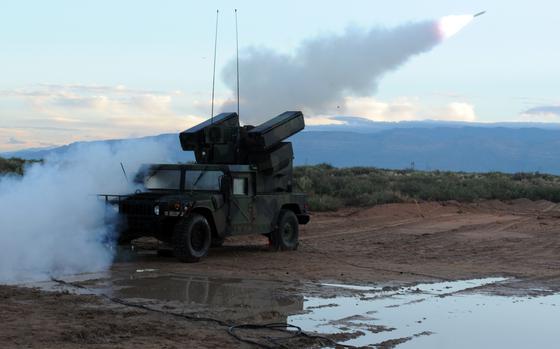 An AN/TWQ-1 Avenger with the 1st Battalion, 204th Air Defense Artillery Regiment of the Mississippi Army National Guard fires a Stinger missile at a drone during a live fire exercise at Fort Bliss, Texas, Oct. 8, 2015. Approximately 170 Soldiers of the 204th, headquartered in Newton, Miss., are mobilized to protect and guard the skies and no-fly zones of Washington, D.C. (Mississippi National Guard photo by Staff Sgt. Scott Tynes, 102nd Public Affairs Detachment/Released)