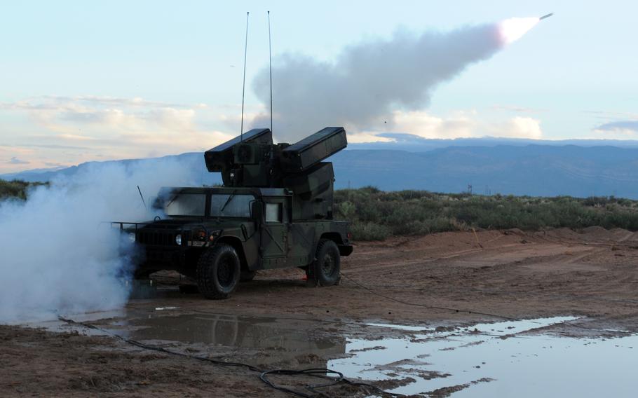 An AN/TWQ-1 Avenger with the 1st Battalion, 204th Air Defense Artillery Regiment of the Mississippi Army National Guard fires a Stinger missile at a drone during a live fire exercise at Fort Bliss, Texas, in 2015. 