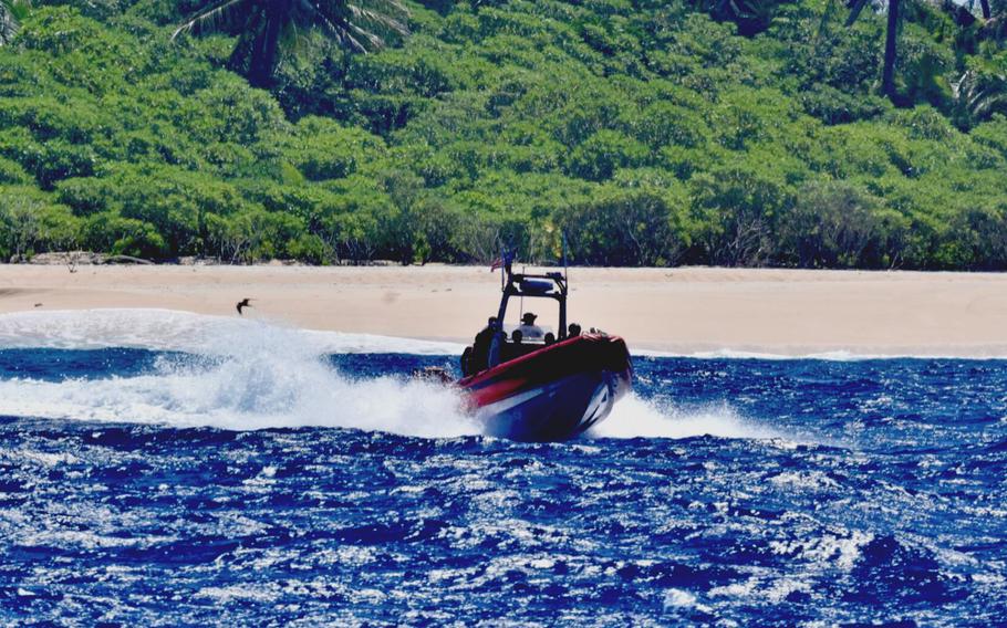 The crew of USCGC Oliver Henry rescues three mariners stranded on Pikelot Atoll, Yap State, Federated States of Micronesia, on April 9, 2024. 