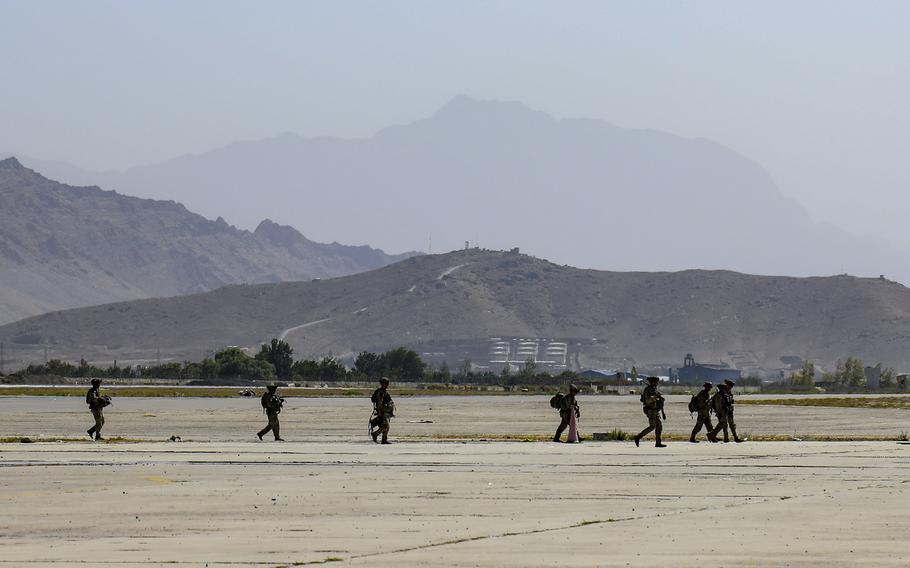 Paratroopers assigned to the 1st Brigade Combat Team, 82nd Airborne Division conduct security operations as they continue to help facilitate the evacuation at Hamid Karzai International Airport in Kabul, Afghanistan on Wednesday, Aug 25, 2021. 