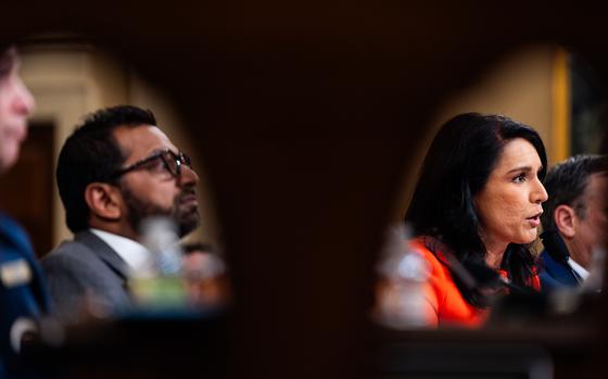 Director of National Intelligence Tulsi Gabbard and FBI Director Kash Patel attend a House Intelligence Committee hearing on Capitol Hill on March 26. MUST CREDIT: Demetrius Freeman/The Washington Post