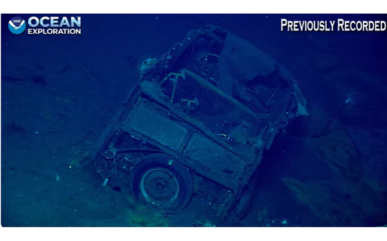A grainy look at the car found in the sunken WWII ship.