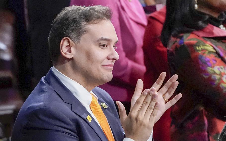 Rep. George Santos, R-N.Y., claps in the House Chamber during the State of the Union address on Feb. 7, 2023.