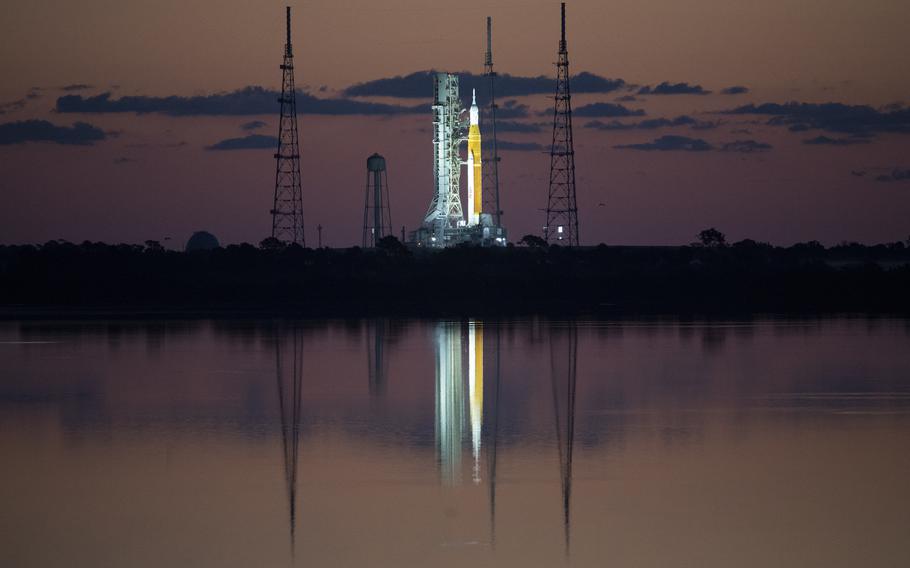 In this photo released by NASA, the Space Launch System (SLS) rocket with the Orion spacecraft aboard is seen at sunrise atop a mobile launcher at Launch Complex 39B at NASA’s Kennedy Space Center in Cape Canaveral, Fla., Monday, April 4, 2022, in preparation for the Artemis I wet dress rehearsal test.