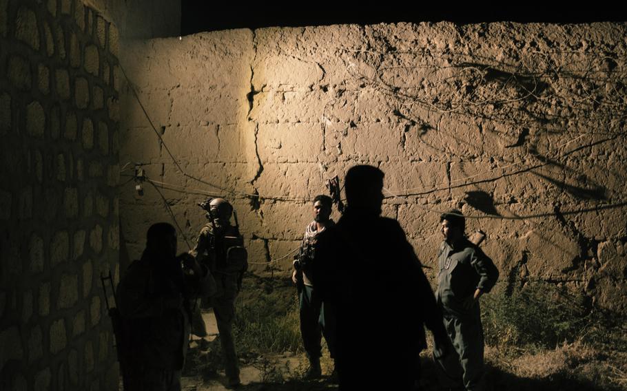 Members of the Afghan special forces check the perimeter of Kunduz prison. The security services received information signaling that the Taliban might attack the prison during the night to free the prisoners. 