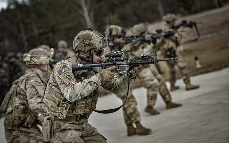 Soldiers with the U.S. Army's 82nd Airborne Division drill with Polish troops in February 2022 at the Nowa Deba training ground in southeast Poland. Soldiers from the 82nd and 101st airborne divisions were ordered to Poland recently on a mission to reassure allies concerned about potential Russian aggression. 