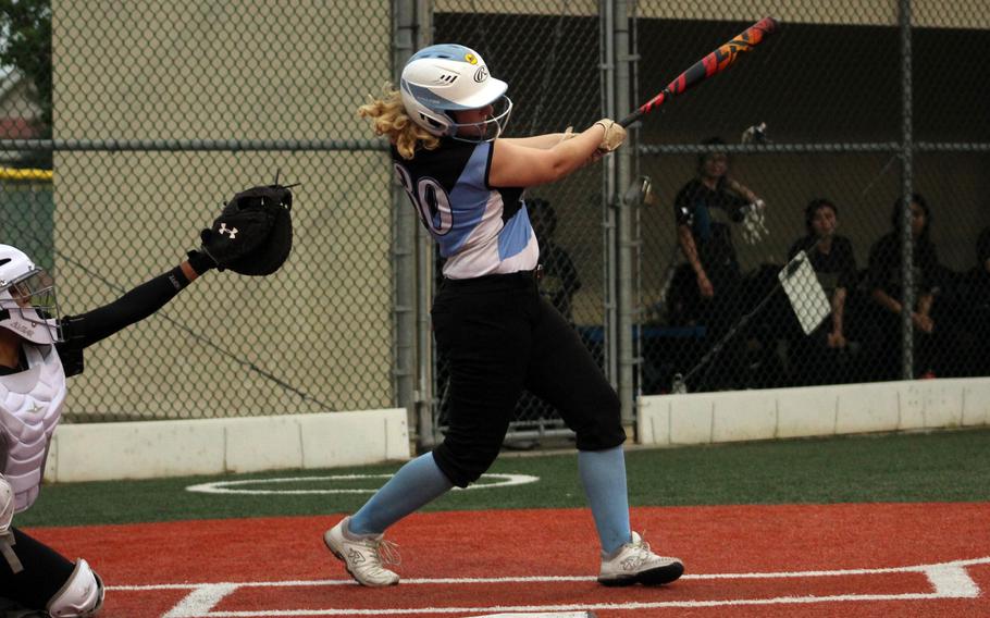 Osan's Maddy Smith connects for a hit against Humphreys during Tuesday's DODEA-Korea softball game. The Blackhawks won 11-9.