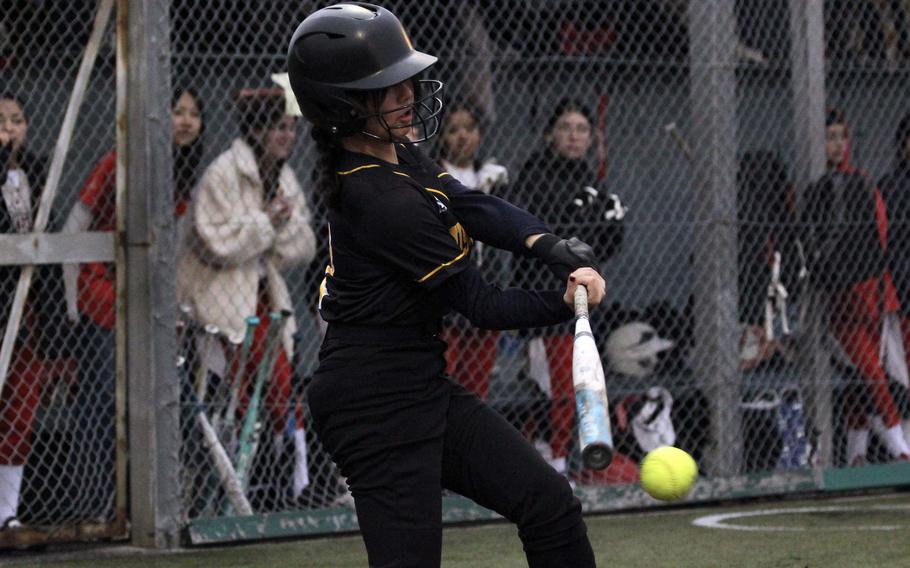 Ellie Yan hits the ball.