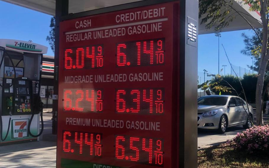Prices posted at a gas station in the Linda Vista neighborhood of San Diego, in late March. The average price for regular gasoline in California remains near its record high of $5.919 a gallon, recorded on March 29, 2022.