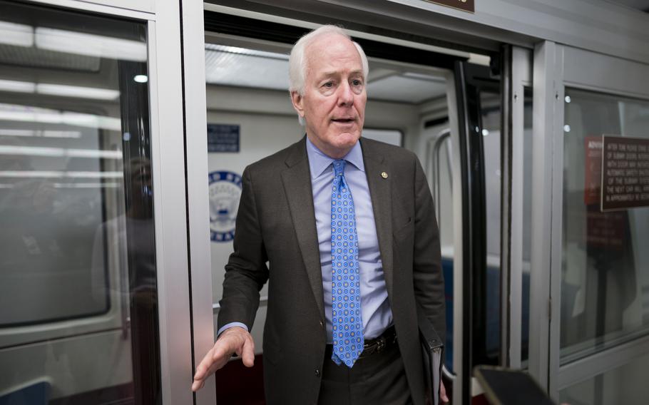 In this May 26, 2021, photo, Sen. John Cornyn, R-Texas, speaks to reporters at the Capitol in Washington. Each military service branch must conduct a review of how it handles missing persons reports as part of the 2022 National Defense Authorization Act. Cornyn said he introduced the legislation to prevent future tragedies “by requiring updates to military installation security procedures and by focusing on stronger partnerships between installations and law enforcement.”