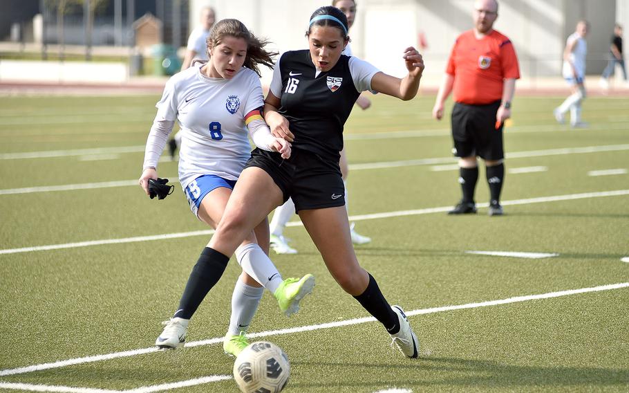 Ramstein captain Julia Atkins and Stuttgart senior Serenity Brown fight for the ball during a match April 27, 2024, at Stuttgart High School in Böblingen, Gemany.