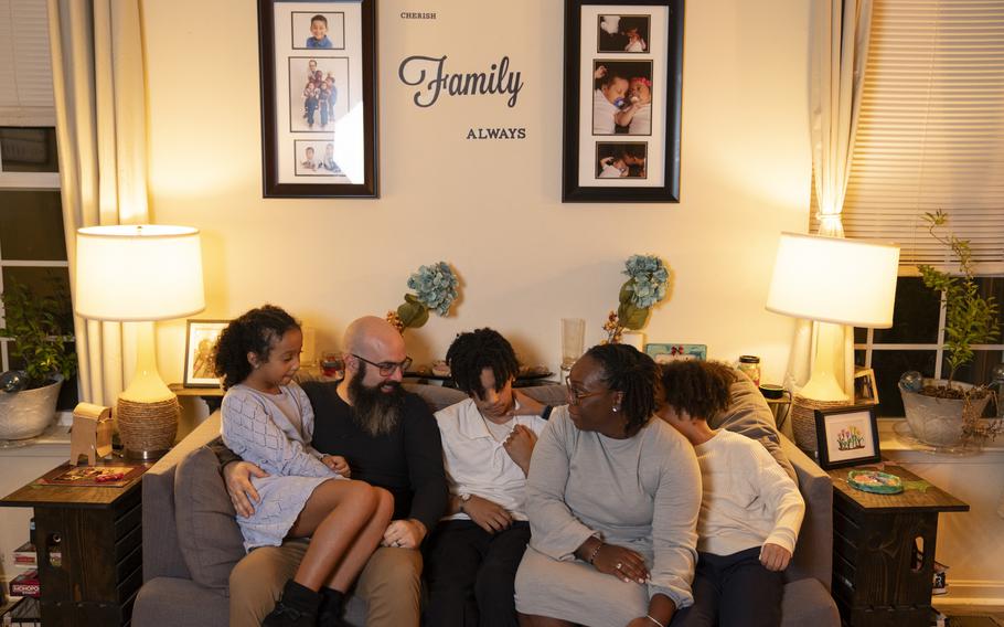 Michelle and Tim Farris with their children, Abigail, 9, Seth, 13, and Owen, 9, at home in Glen Burnie, Md. 
