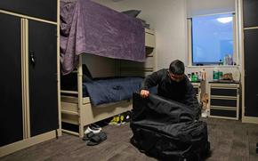 Seaman Recruit Jon Ramos moves into the multipurpose facility at Naval Support Facility Redzikowo, Poland, Jan. 11, 2022. NSF Redzikowo is the Navy's newest installation, with the mission of supporting the Aegis Ashore missile defense system.