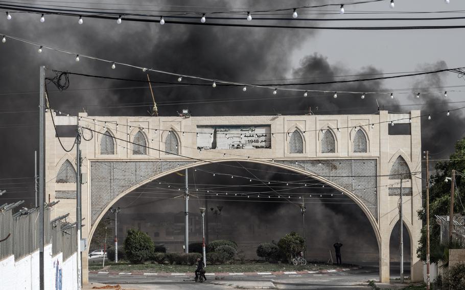 Tires burn in protest at the entrance to Aqbat Jabar refugee camp, a densely populated urban slum in Jericho that is home to 13,000 people.