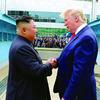 Then-President Donald Trump speaks with North Korean leader Kim Jong Un on the North Korean side of the Joint Security Area in the Demilitarized Zone, June 30, 2019.
