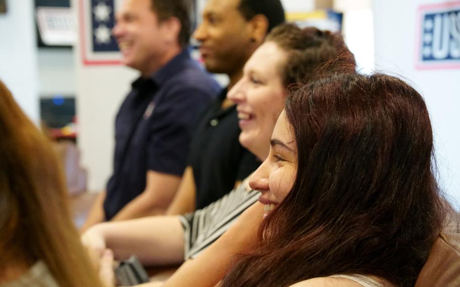 Service members and veterans take part in a virtual meetup with the stars of “The Covenant,” Jake Gyllenhaal and Dar Salim, at the USO on Yokosuka Naval Base, Japan, Friday, April 21, 2023.