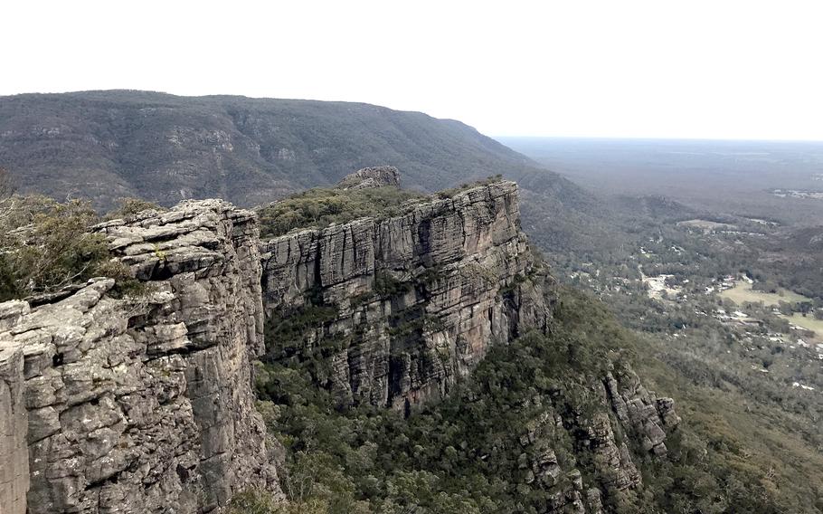 A jagged, sharp cliff creates a steep dropoff.