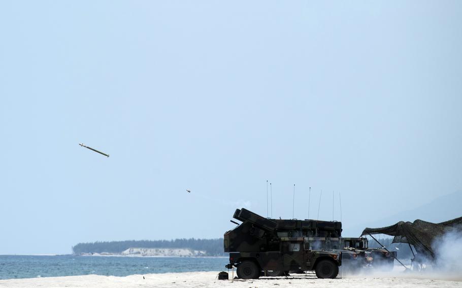A Stinger missile is fired from an Avenger Air Defense System mounted on a Humvee during a Balikatan drill at Naval Station Leovigildo Gantioqui in San Antonio, Philippines, Tuesday, April 25, 2023.
