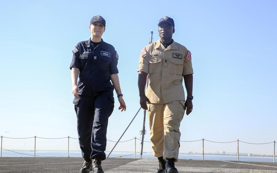 The Navy's new flame-resistant, two-piece organizational uniform, comonly known as the 2POC, is dark blue for E-6 and below and khaki for E-7 and above, including officers.