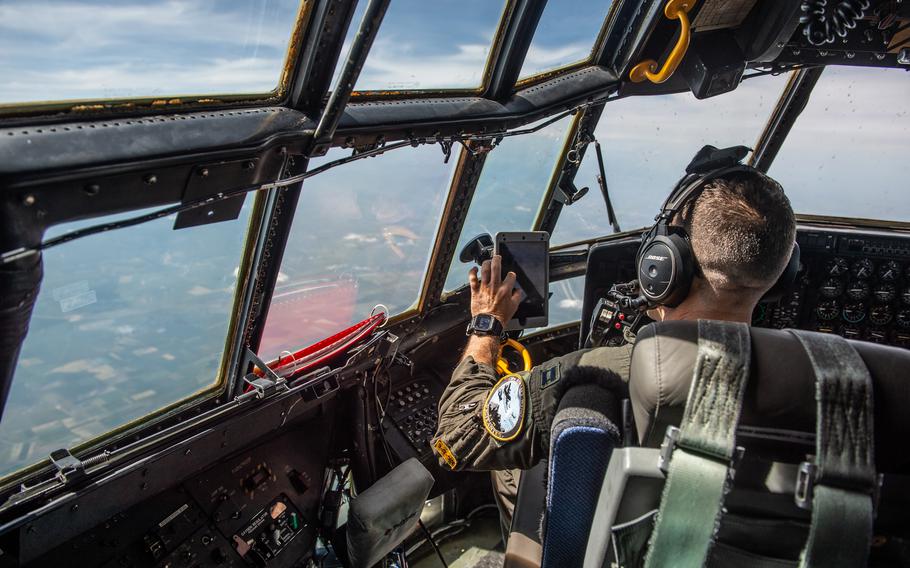 Capt. Ryan Caldwell, a C-130 Hercules pilot with the Montana Air National Guard’s 120th Airlift Wing, flies over Romania on June 6, 2023. U.S. and Polish soldiers took part in a medical evacuation training flight.