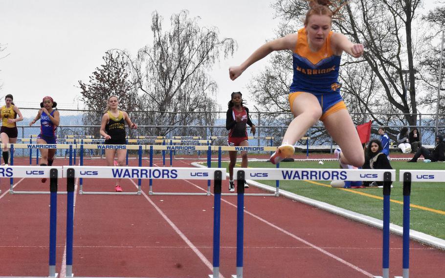 Wiesbaden senior Ava Stout clears a hurdle en route to winning the 300-meter hurdles on Saturday in Wiesbaden, Germany. Stout also won the 100-meter hurdles as she looks to defend her European titles in both hurdle events next month at Europeans.