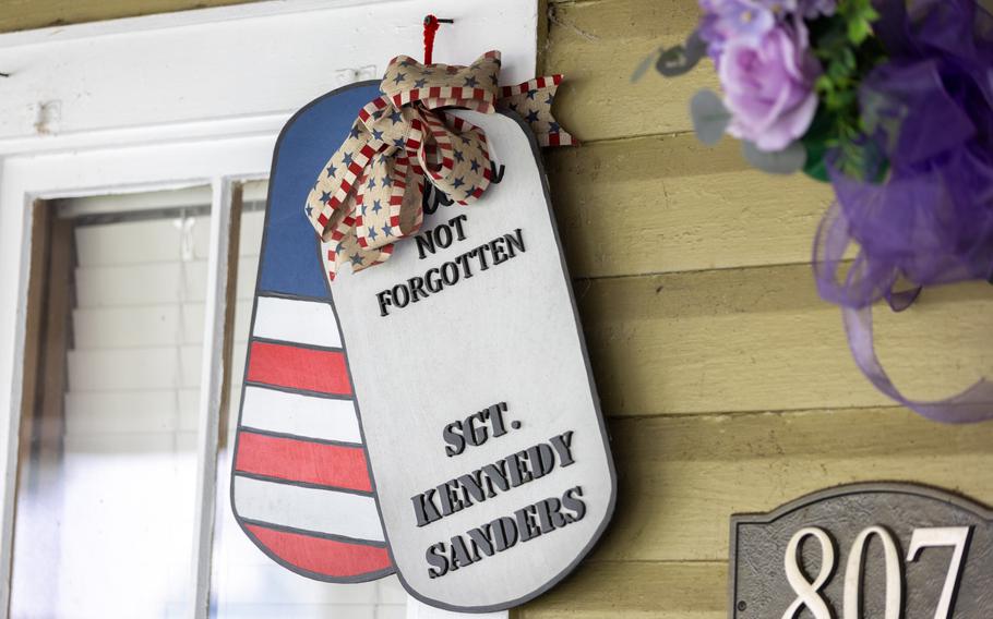 Art resembling dog tags honors Sgt. Kennedy L. Sanders.