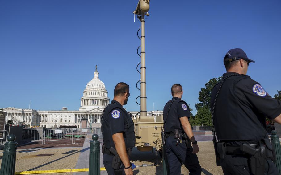 In this Sept. 10, 2021, photo, a video surveillance apparatus is seen on the East Front of the Capitol in Washington as security officials prepare for a Sept. 18 demonstration by supporters of the people arrested in the Jan. 6 riot. The camera surveillance system is on permanent loan from the U.S. Army but will be operated by the Capitol Police to enhance security around the Capitol grounds. Law enforcement officials concerned by the prospect for violence at a rally in the nation’s capital Saturday have reinstall protective fencing that surrounded the U.S. Capitol for months after the Jan. 6 insurrection there.