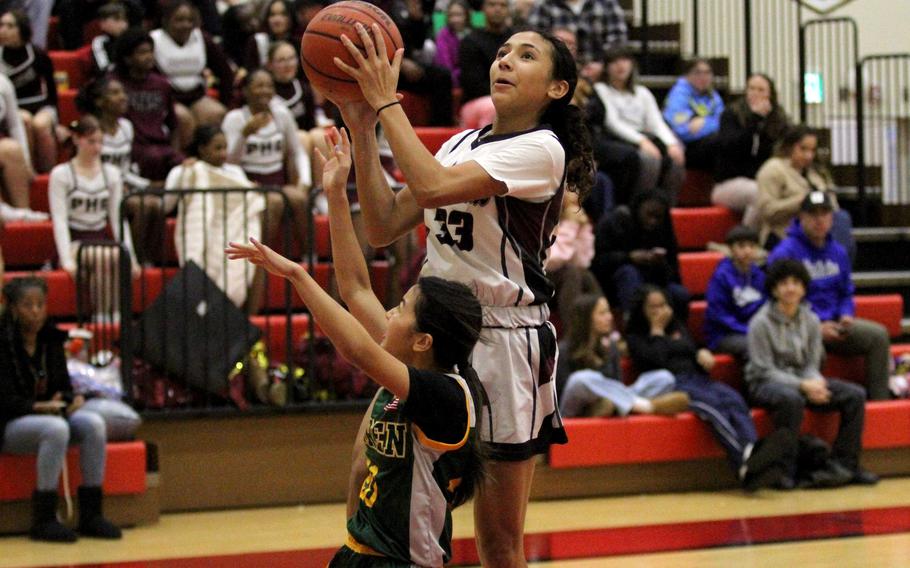 Naiya Burford takes a shot.