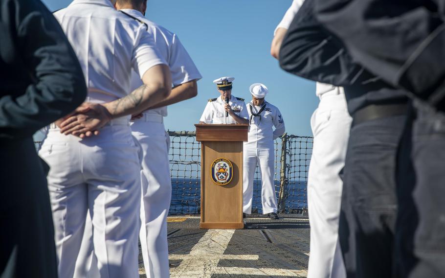 Chaplain (Lt.) Eric Brown speaks during a burial-at-sea ceremony aboard the USS Paul Ignatius in the Atlantic Ocean, June 13, 2021. The Navy announced chaplains will be assigned to every destroyer in the fleet.  