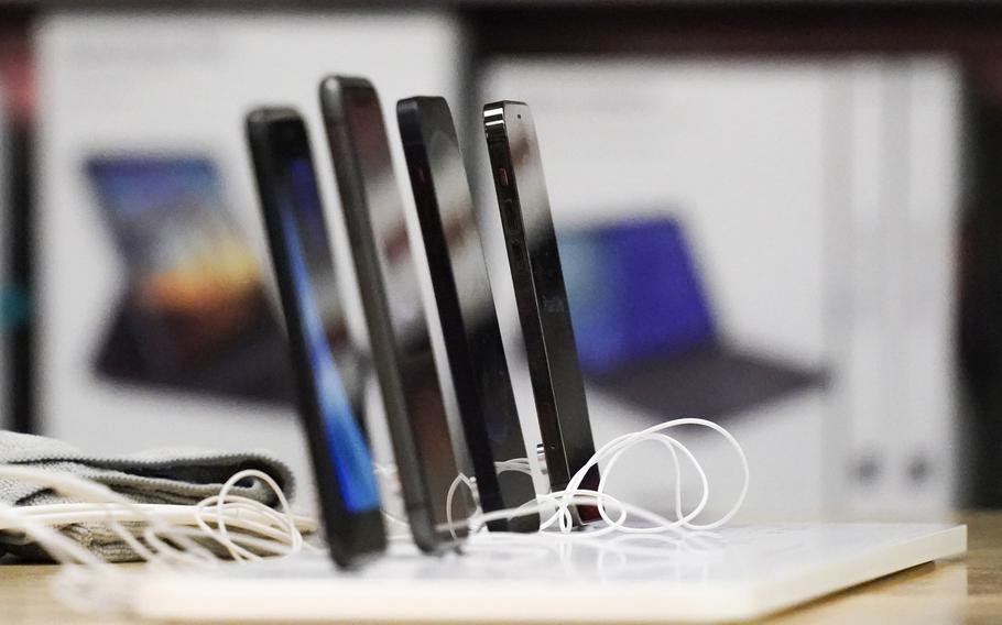 Smart phones are displayed at a shopping mall in Pittsburgh, Feb. 24, 2021. The U.S. Department of Veterans Affairs wasted nearly $2 million dollars when many of the smart phones bought during the pandemic for homeless veterans went unused, according to an inspector general’s report.