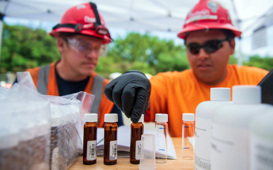 Contractors with the Naval Facilities Engineering Systems Command process water samples March 17, 2022, as a part of monitoring at Red Hill well, which is contaminated with Navy jet fuel.