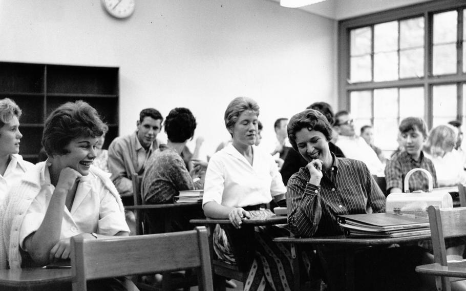 American students at Seoul High School take time out for a laugh Aug. 29, 1960.