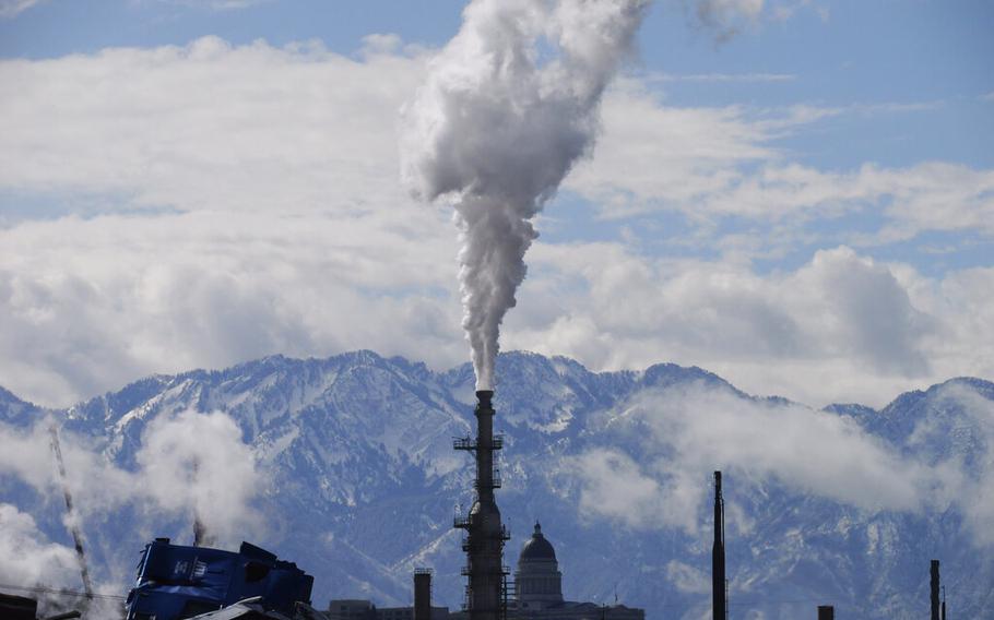 An oil refinery is seen on May 12, 2022, in Salt Lake City. President Joe Biden is promising “strong executive action” to combat climate change, despite dual setbacks that have restricted his ability to regulate carbon emissions and boost clean energy such as wind and solar power. 