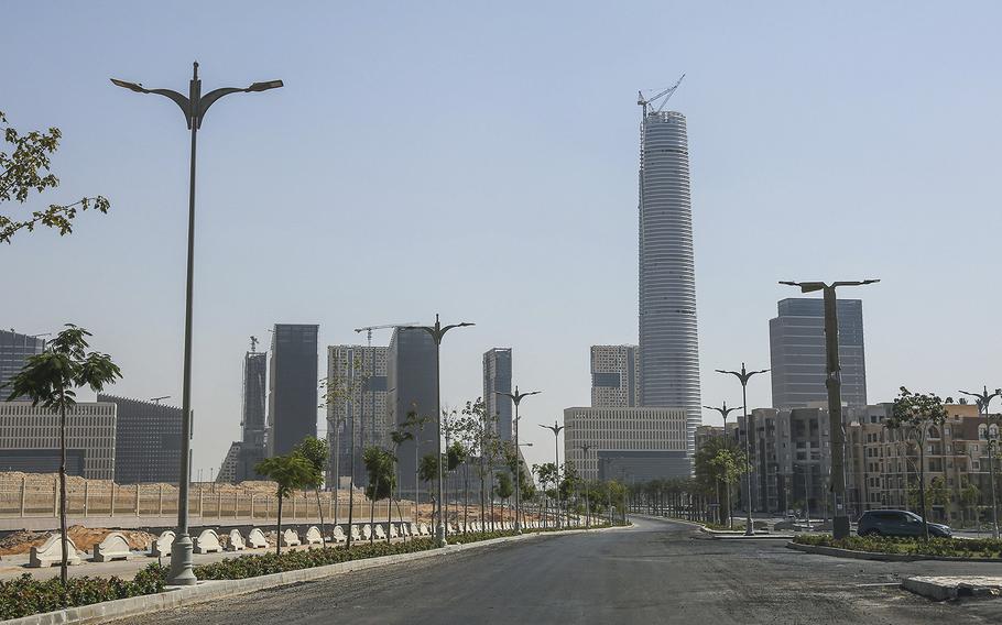 Under-construction skyscraper buildings in the central business district beyond residential complexes in Egypt’s New Administrative Capital. 