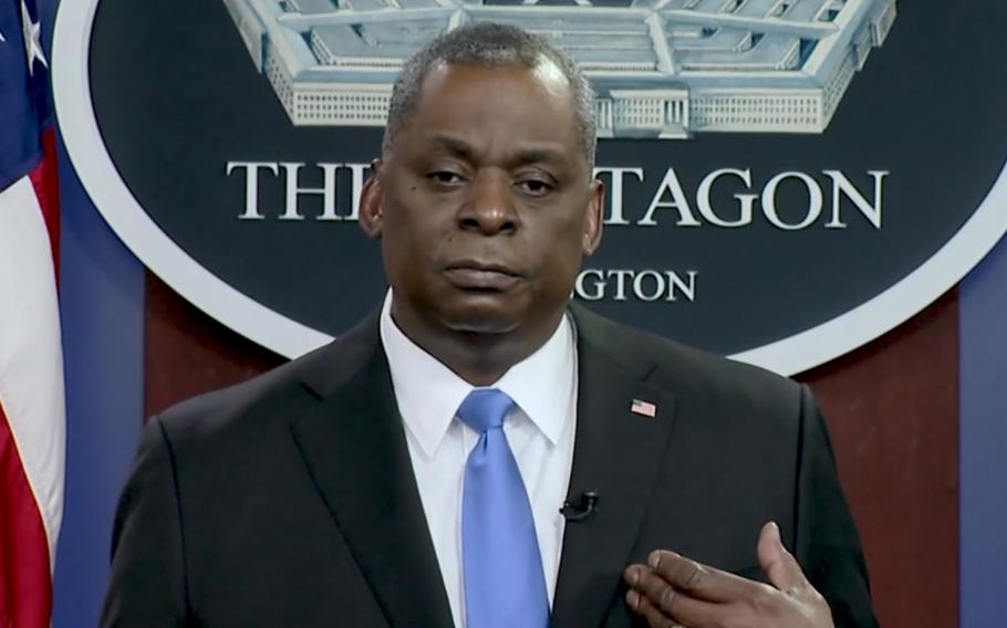 U.S. Defense Secretary Lloyd Austin speaks to U.S. service members about the coronavirus vaccine in this screengrab of a video posted online Wednesday, Feb. 24, 2021, by the Pentagon.