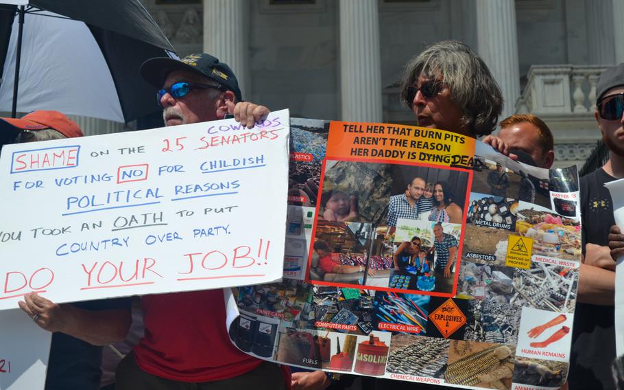 Protesters on the steps of the Capitol in Washington on Monday, Aug. 1, 2022, calling on the Senate to pass the PACT Act — legislation that would expand eligibility for health care and benefits for veterans exposed to burn pits and other toxins.