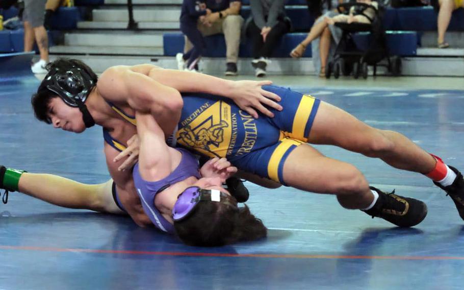 Guam High 113 pounder Koa Deloach won by pin and walkover to help the Panthers win their two dual meets Saturday over George Washington and Okkodo.
