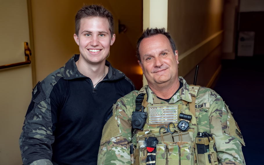 Cooper Mann and his father, Scott Mann, backstage at a show in San Diego in May 2023.