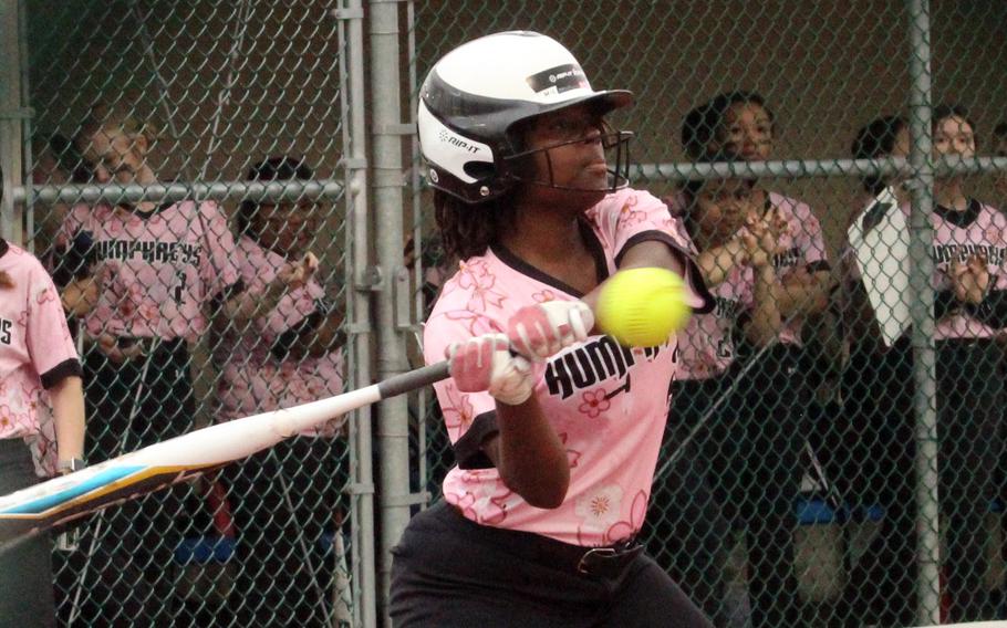 Humphreys' Simone Platt connects against Osan during Thursday's DODEA-Korea softball doubleheader. The Blackhawks won 18-2 and 13-12.