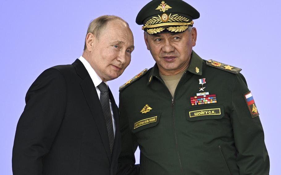 Russia’s President Vladimir Putin and Russian Defense Minister Sergei Shoigu attend the opening of the Army 2022 International Military and Technical Forum in the Patriot Park outside Moscow, Russia, Monday, Aug. 15, 2022. Putin has announced a partial mobilization in Russia as the fighting reaches nearly seven months. Putin’s address to the nation on Wednesday, Sept. 21, 2022 comes a day after Russian-controlled regions in eastern and southern Ukraine announced plans to hold votes on becoming integral parts of Russia.