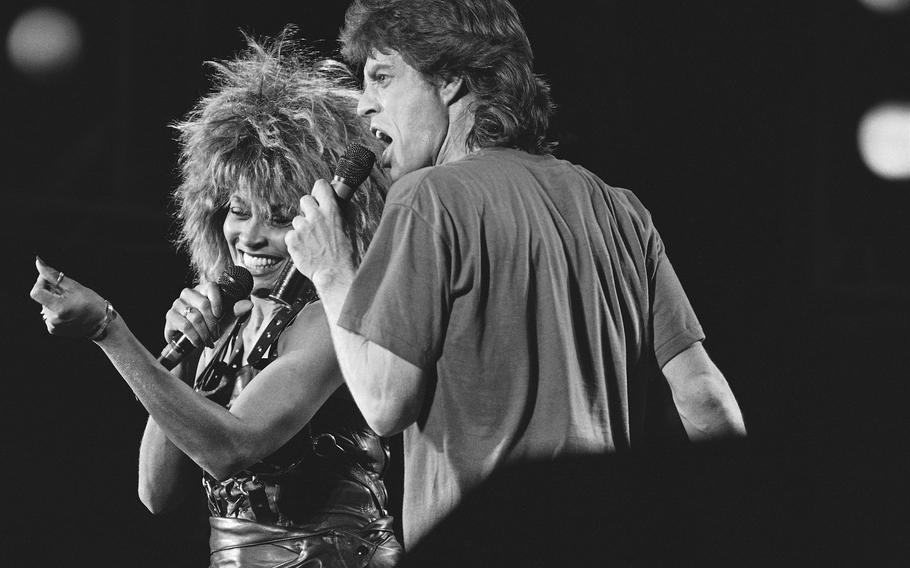 Singer Tina Turner, left, and Mick Jagger perform together during Live-Aid concert on July 14, 1985, in Philadelphia. 