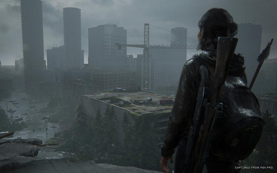 Ellie explores the ruined remains of Seattle in search of revenge in The Last of Us Part II. 
