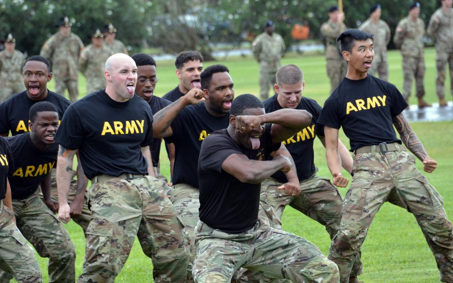 Soldiers of the 25th Infantry Division perform the Hui Ha’a Koa, a traditional Hawaiian warriors dance, during a change-of-command ceremony at Schofield Barracks, Hawaii, Friday, July 23, 2021.